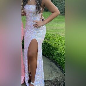 Adorable long dress. iridescent detailing. Ties in the back. WORN ONCE